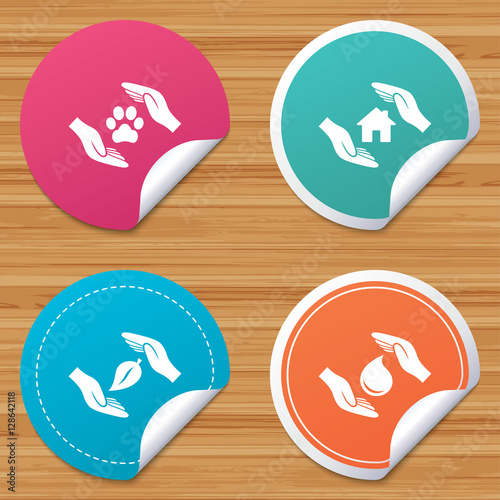 Round stickers or website banners. Hands insurance icons. Shelter for pets dogs symbol. Save water drop symbol. House property insurance sign. Circle badges with bended corner. Vector