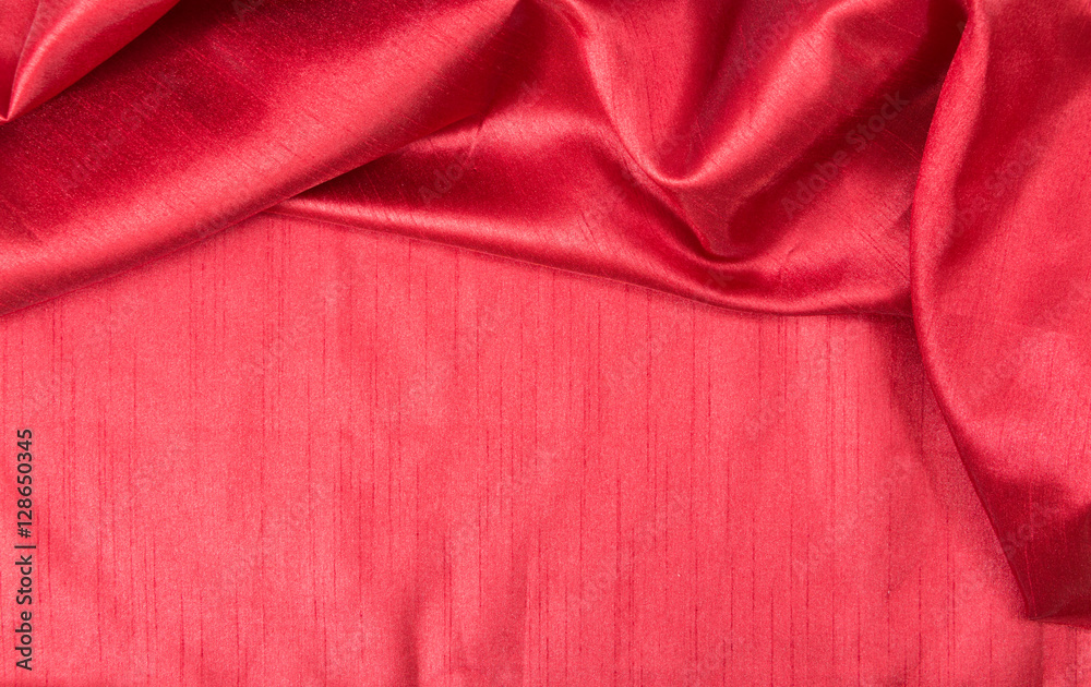 Rich red wavy fabric texture / background. Rich red wavy fabric texture / background.