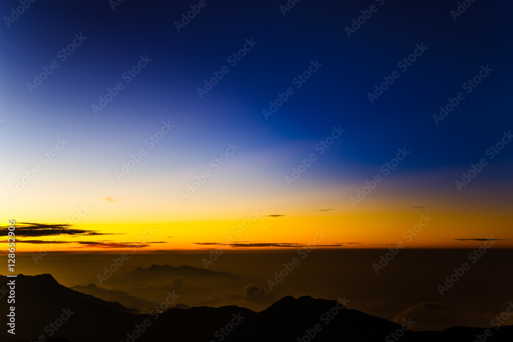 Beautiful sunrise on the mountain Adam's Peak. Sri Lanka.