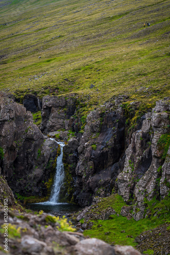 Waterfall at the Akrafjall mountain in Iceland