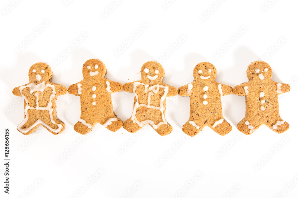 Gingerbread men cookies holding hands, on white background. Gingerbread men cookies holding hands, on white background.