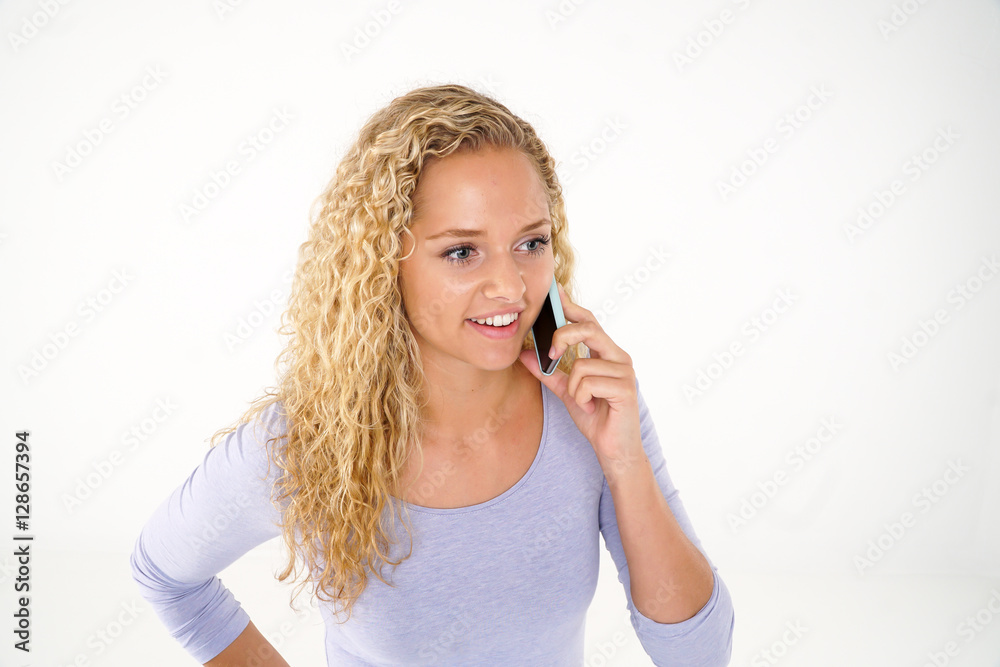 Beautiful blonde girl talking on mobile phone Beautiful blonde girl talking on mobile phone