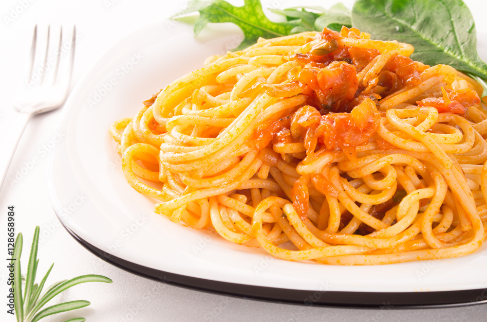 Spaghetti with vegetable sauce and herbs close-up Spaghetti with vegetable sauce and herbs close-up