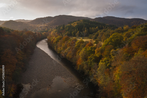 Looking down on the River Garry with the Autumnal trees lining it's banks.  photo