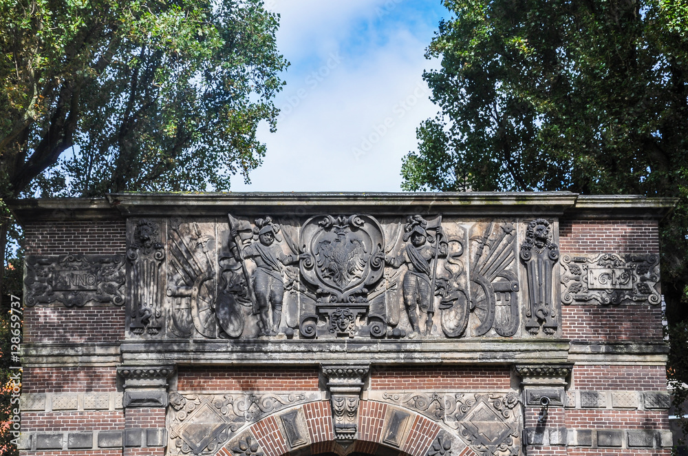 Reliefs in a door of the 17th century, Amsterdam, Holland