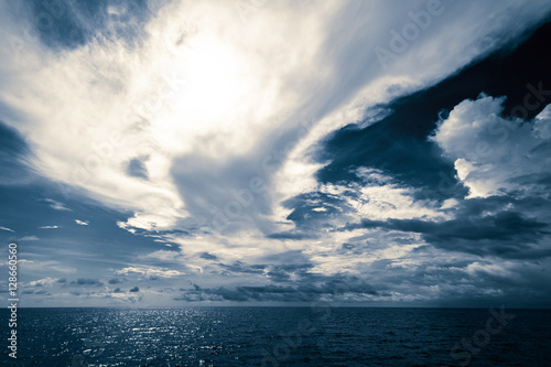 Open ocean and cloudy sky