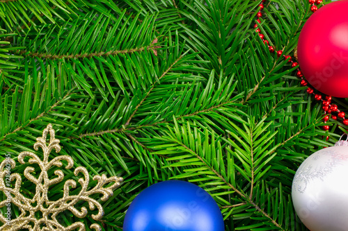 background of the Christmas tree balls and garlands stars