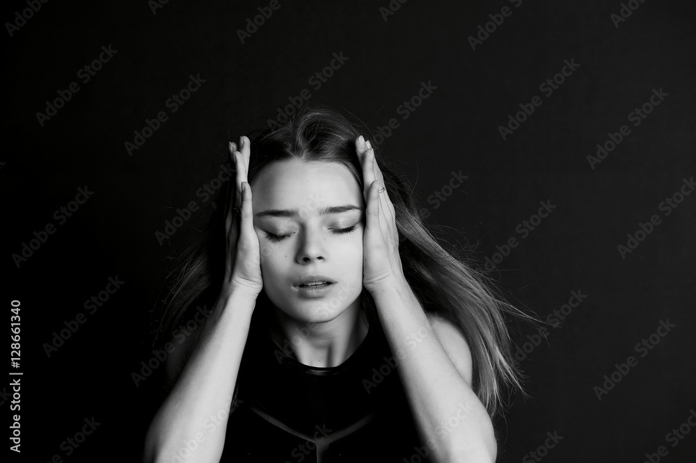 Young girl holding whiskey as headaches. BW