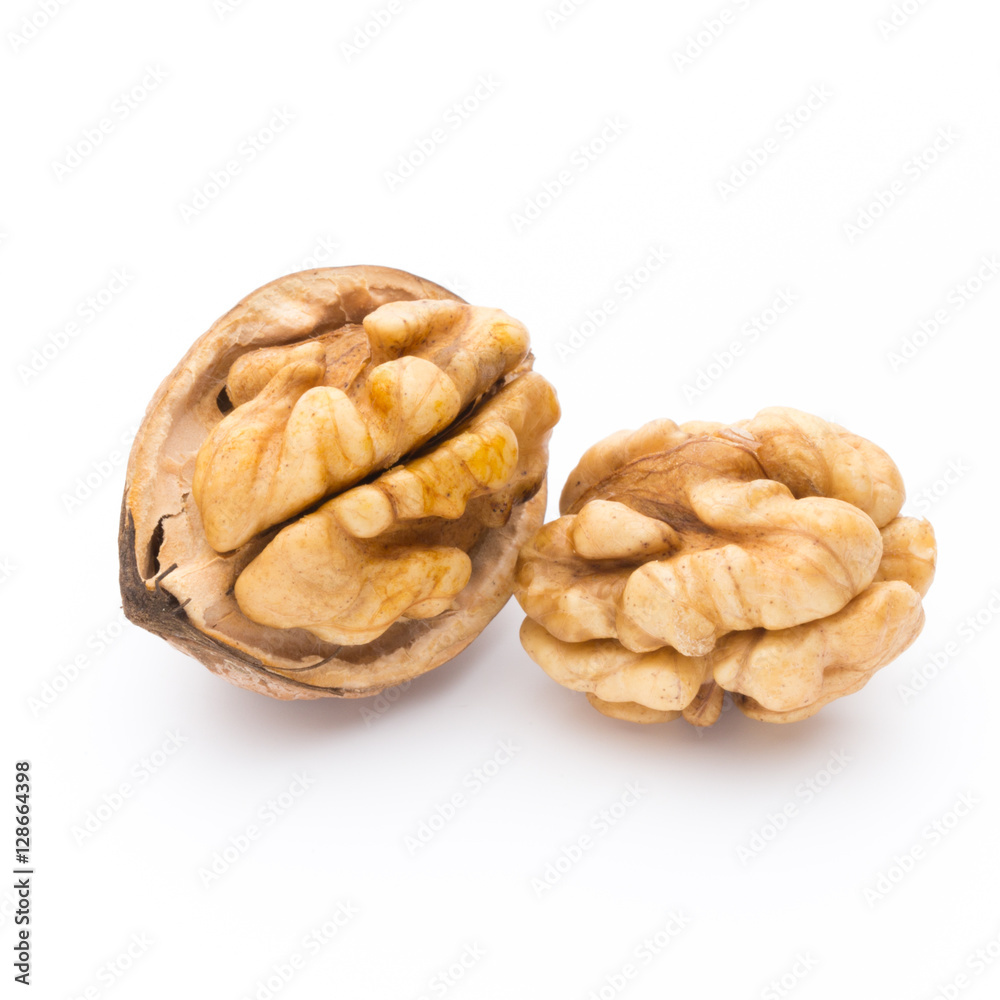 Walnut and walnut kernel isolated on the white background. Walnut and walnut kernel isolated on the white background.