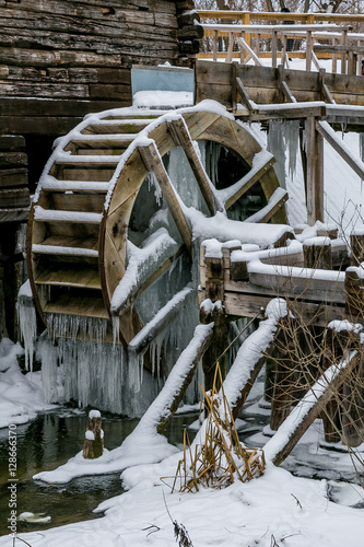 Waterwheel of old watermill in Krasnikovo, Kursk region. 
