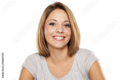 portrait of beautiful young woman on white background