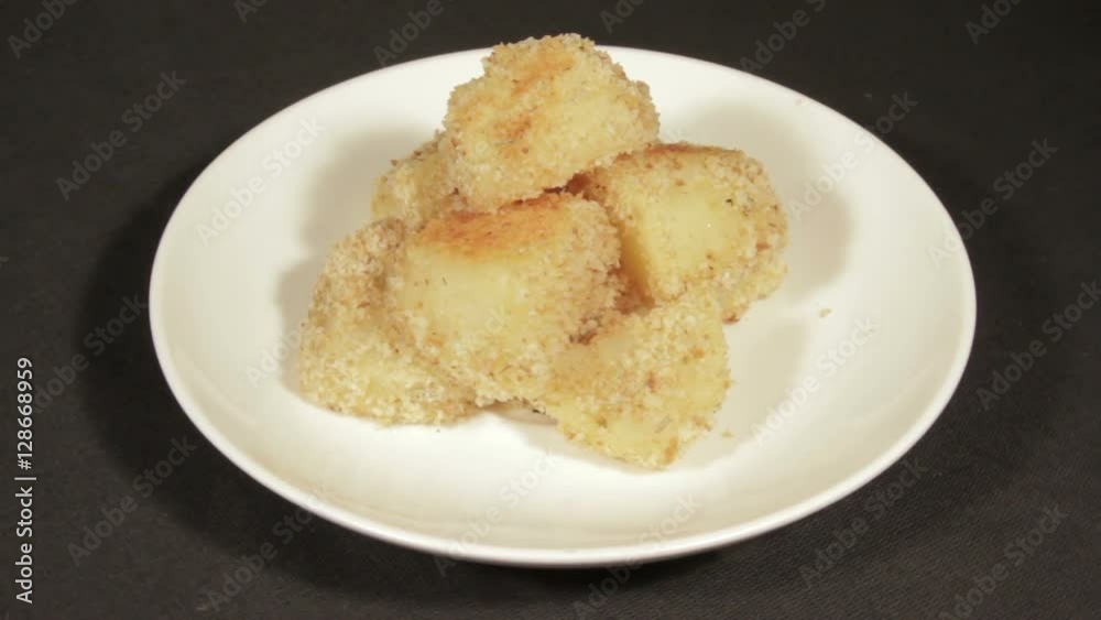 Potatoes with a crispy crust, baked in the oven Potatoes with a crispy crust, baked in the oven