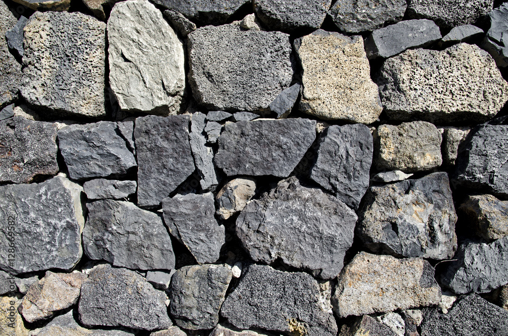 Close up of old stone wall texture. Architecture vintage brick background Close up of old stone wall texture. Architecture vintage brick background