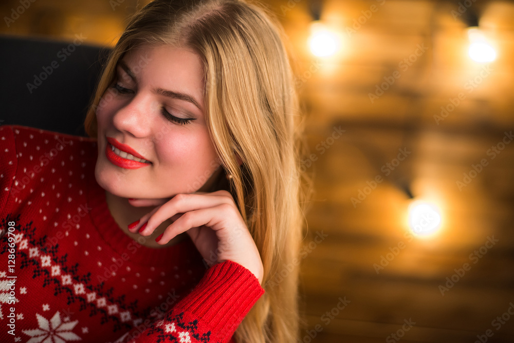 Portrait of a young attractive woman on the background lights Portrait of a young attractive woman on the background lights