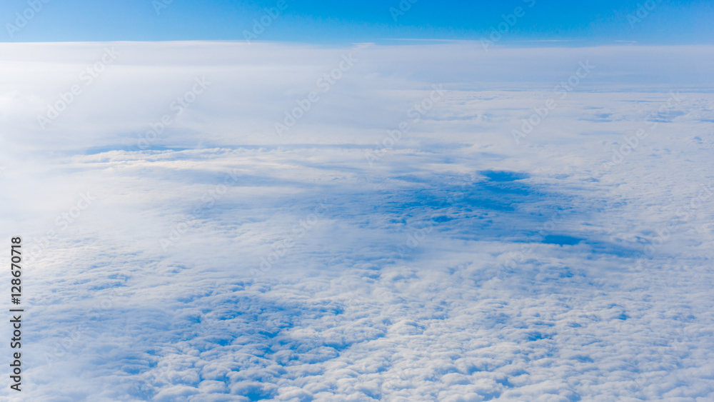  clouds from airplane window. height of 10 000 km.  Clouds