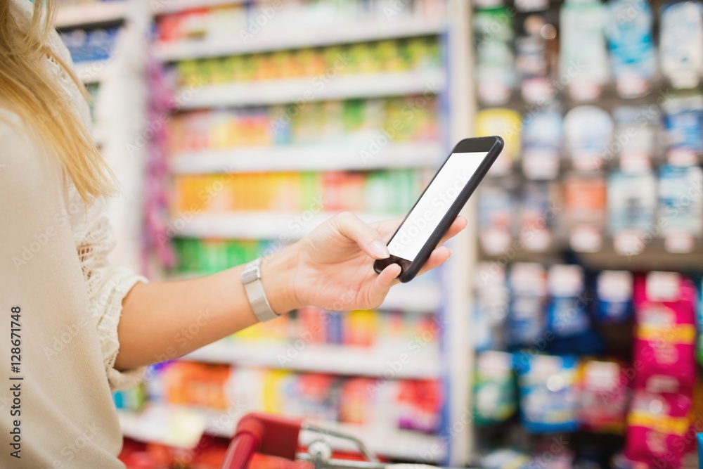 Cropped image of woman using smartphone Cropped image of woman using smartphone