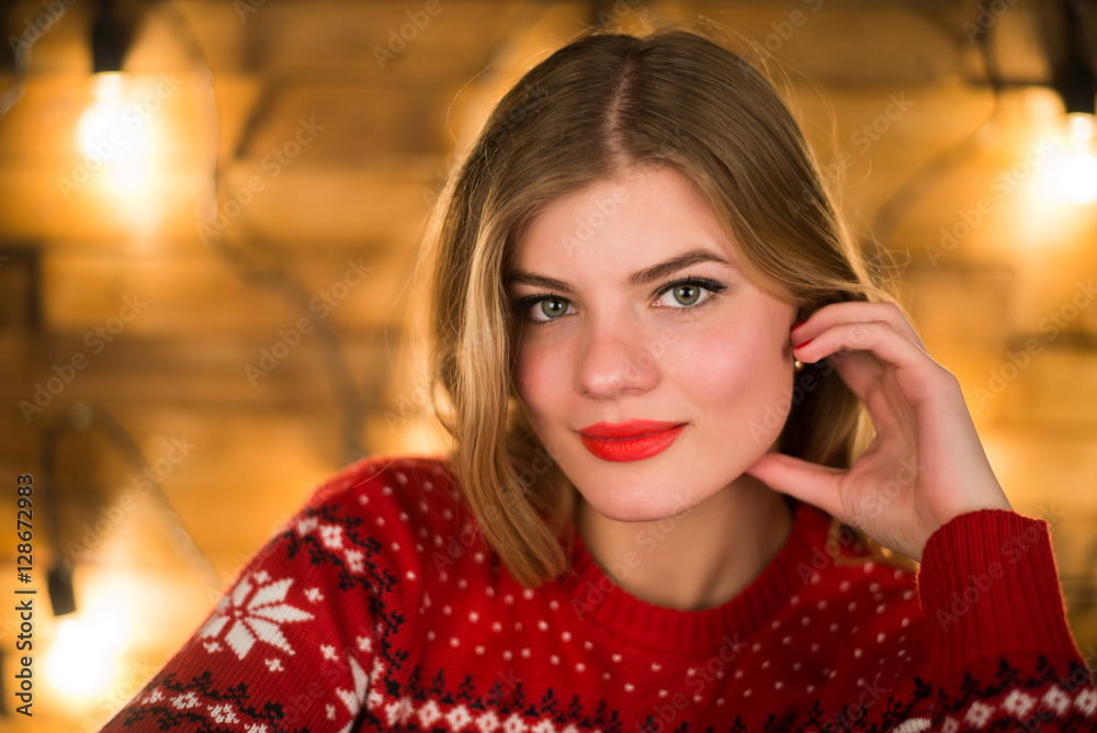 Portrait of a young attractive woman on the background lights Portrait of a young attractive woman on the background lights