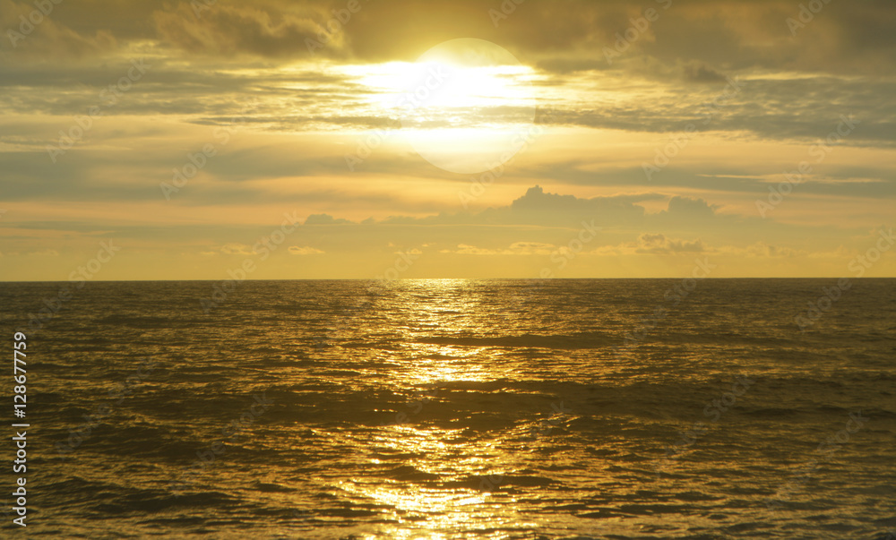 Golden Sky and sea in sunset at Bangniang Beach ,Khao Lak, Phang Nga Province,Thailand