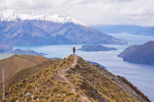 Man stand on Roy's Peak, Wanaka, New Zealand.
