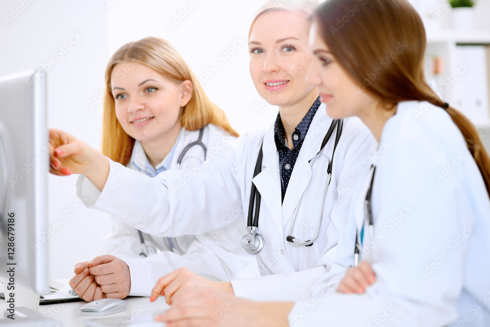 Female doctor leading a medical team at the hospital Female doctor leading a medical team at the hospital