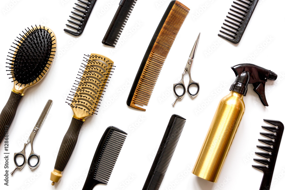 combs and hairdresser tools on white background top view combs and hairdresser tools on white background top view
