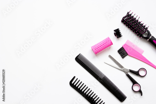 preparations for styling hair on white background top view