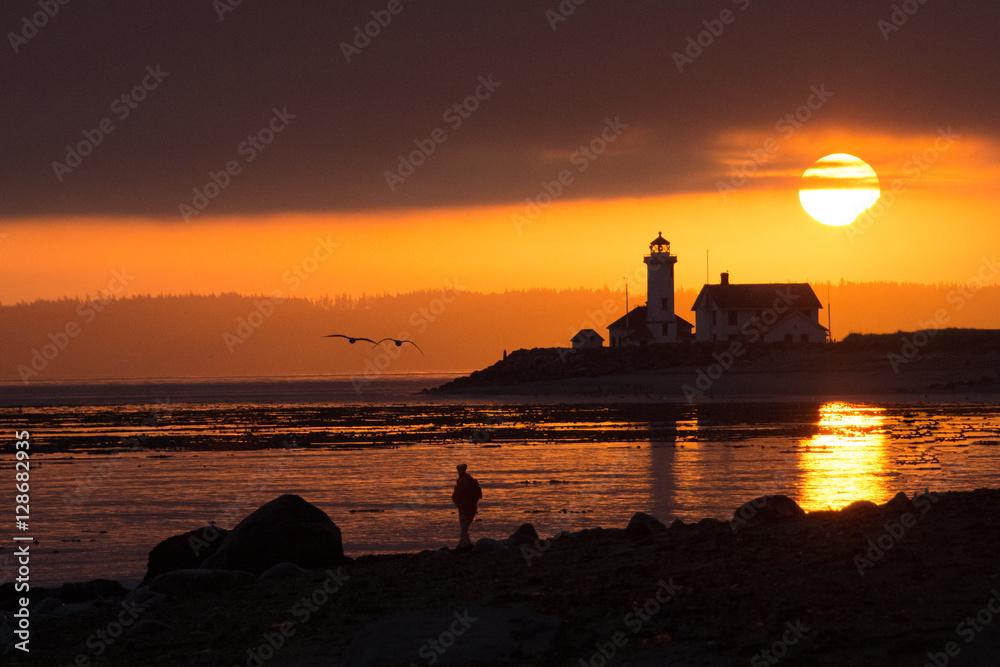 Sunrise over the lighthouse at Ft. Worden.  Port Townsend, Washington.