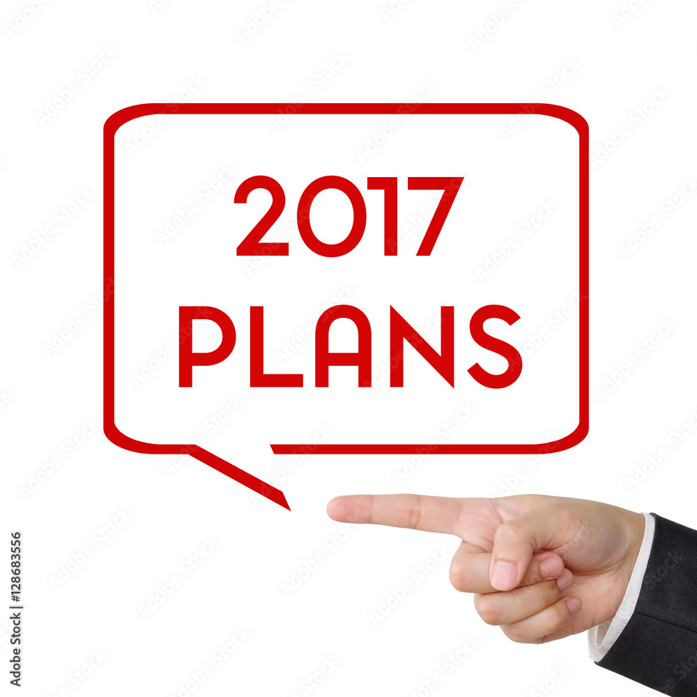 Businessman hand pointing 2017 plans sign on white background Businessman hand pointing 2017 plans sign on white background