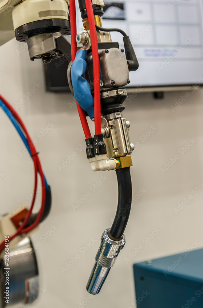 welding Robots machine in the automotive parts industry. welding Robots machine in the automotive parts industry.