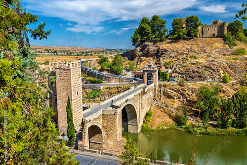The Alcantara Bridge in Toledo, Spain photo