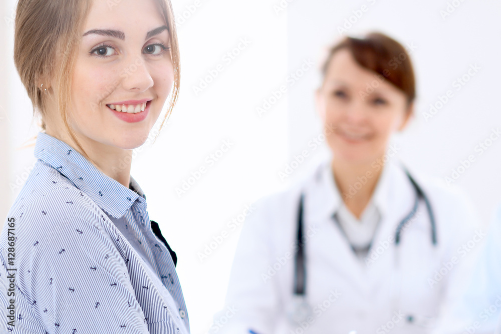 Doctor and patient at meeting. Medicine and health care concept. Doctor and patient at meeting. Medicine and health care concept.