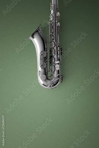 Saxophone on color background