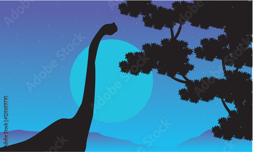 At night brachiosaurus scenery of silhouettes