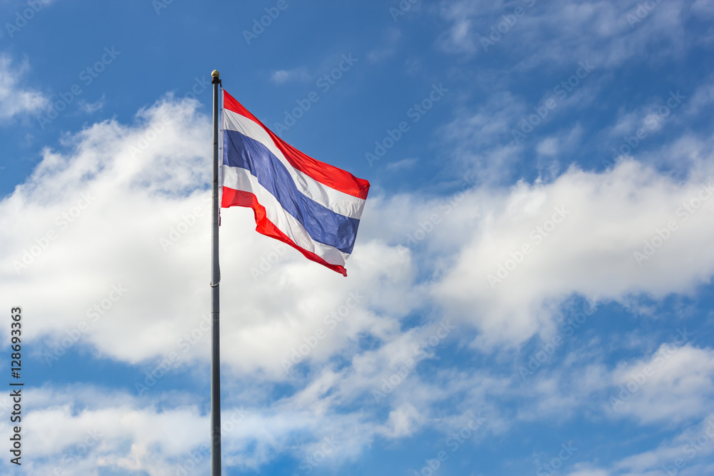 Thailand flag waving in the wind on blue sky Thailand flag waving in the wind on blue sky