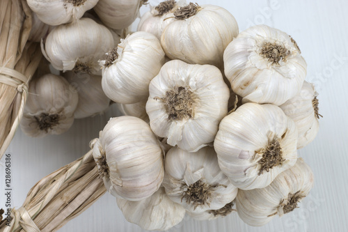 garlic on wooden white background