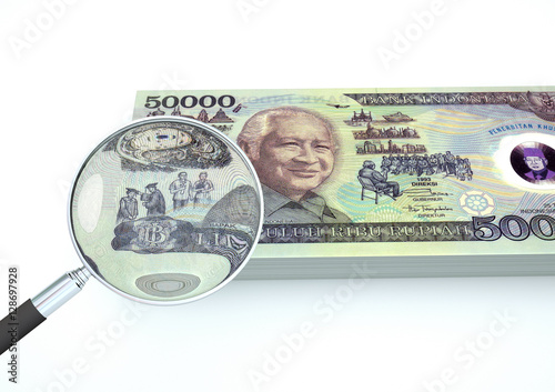 3D Rendered Indonesia money with magnifier investigate currency isolated on white background 