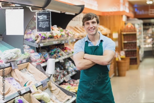 Portrait of man grocer smiling photo