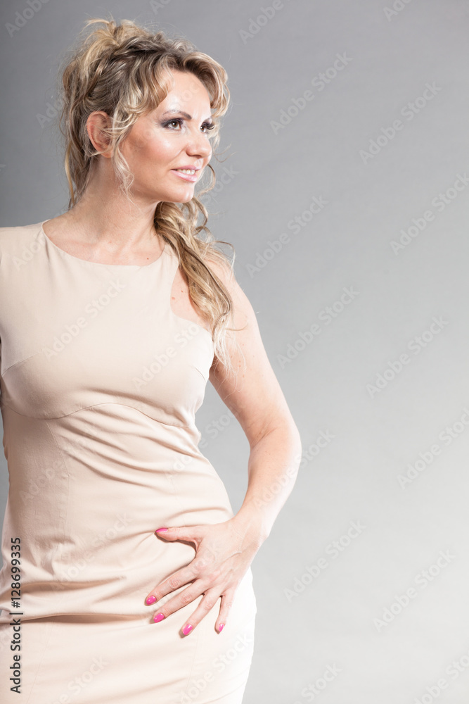 Amazing dress on beautiful blonde female.