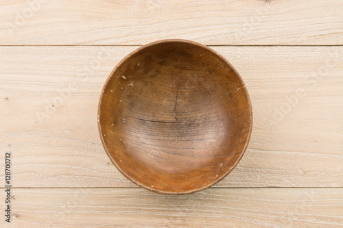 Empty bowl in the wood