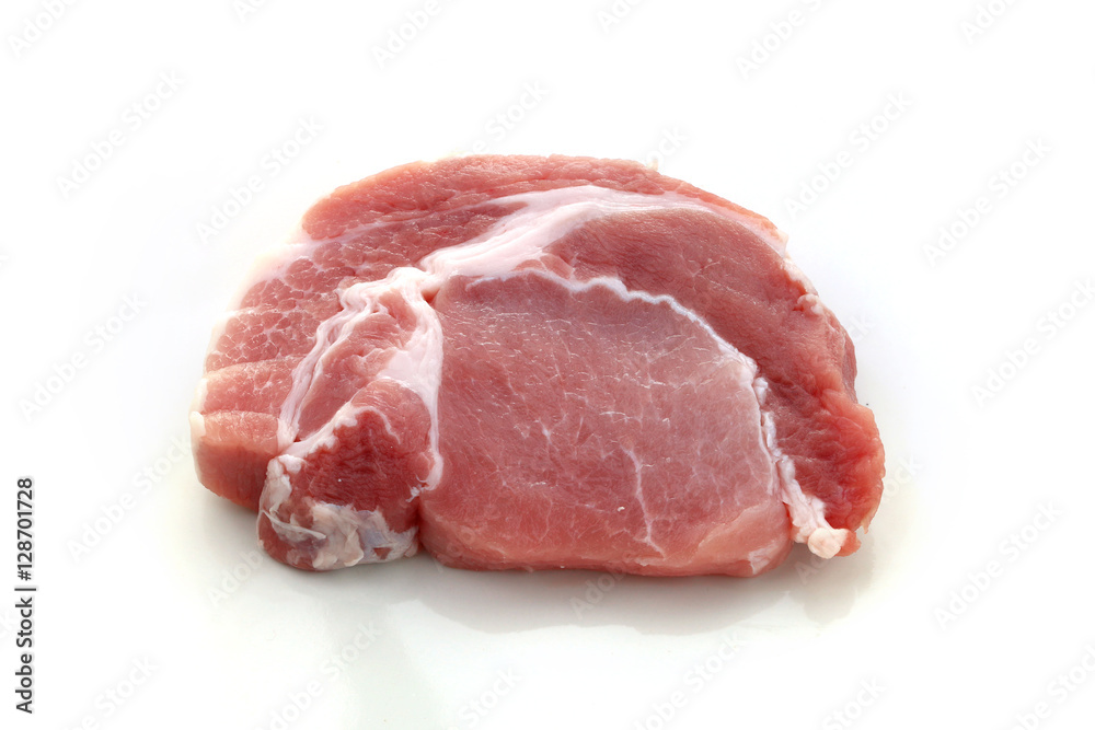 Raw meat, pork, slices pork on a white background Raw meat, pork, slices pork on a white background