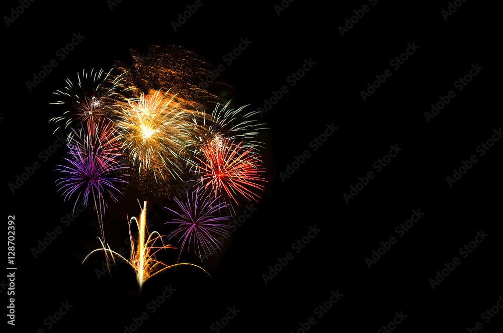 Beautiful colorful fireworks in a night sky