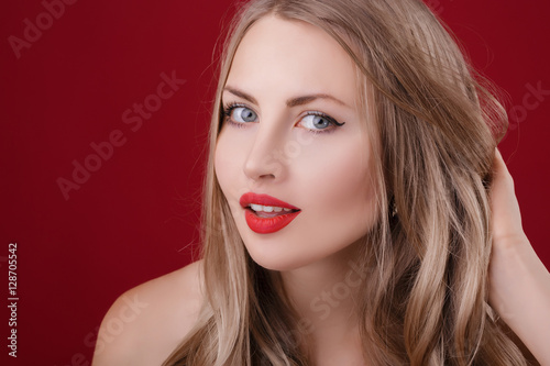 women blonde on red background