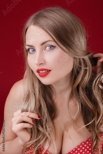 women blonde on red background