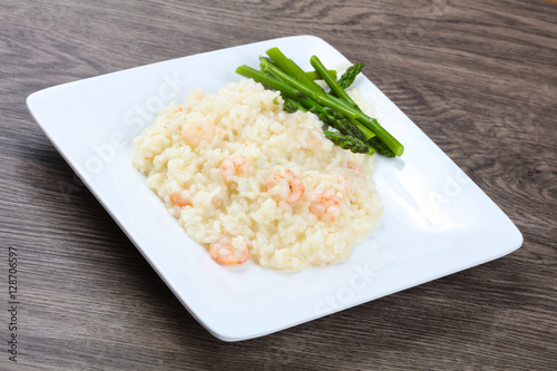 Risotto with shrimps and astaragus photo