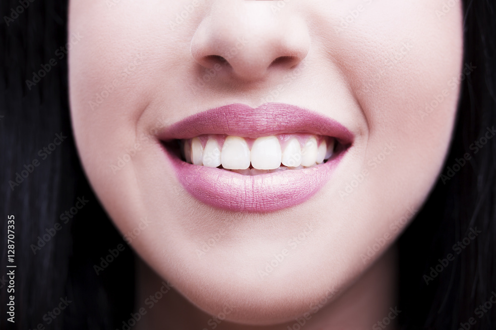 closeup of smile with white healthy teeth closeup of smile with white healthy teeth