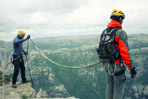 A man jumps from a cliff into the abyss.