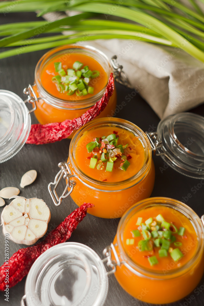 Homemade pumpkin soup on slate plate. Rustic style Homemade pumpkin soup on slate plate. Rustic style