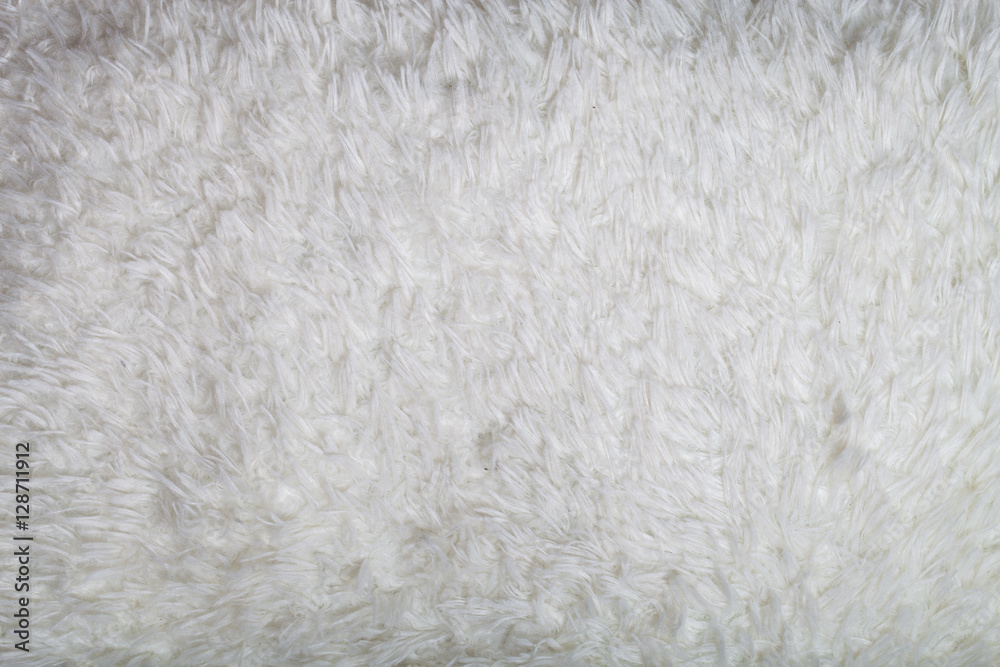 Top view on texture of white artificial fur for background Top view on texture of white artificial fur for background