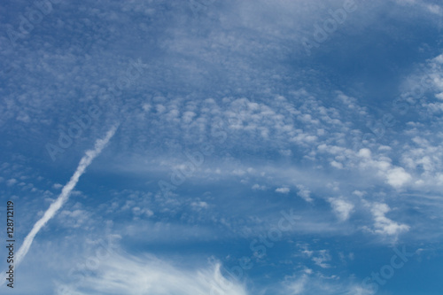 White clouds on a blue sky. Selective focus © strannik_fox