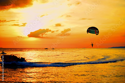 playing parachute beside the sea